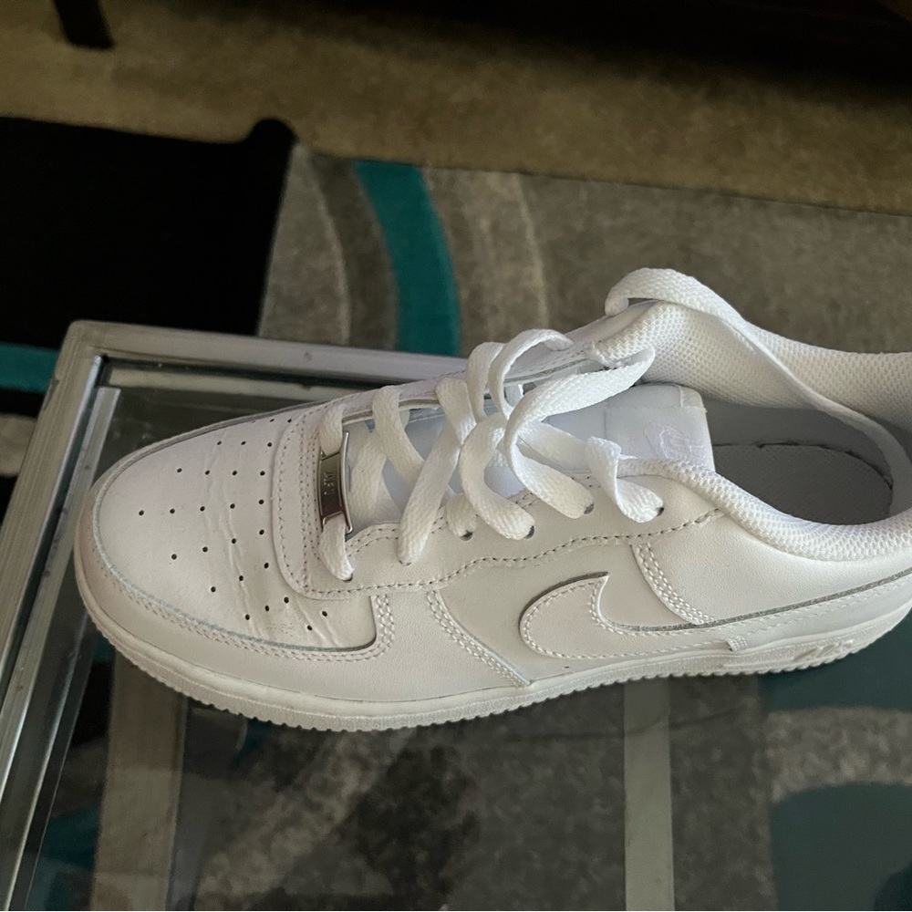All white Nike shoes